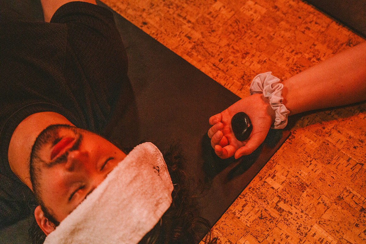 savasana with hot stones and cool towels
